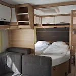مكان تخييم Luxuswohnwagen Forelle Am Kransburger 004